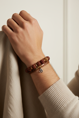 Male model wearing Earth Tone Bracelet natural rudraksha spiritual bracelet on wrist