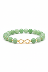 Luxury jade green gemstone bracelet with gold infinity charm, side angle view
