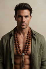Male model wearing Zen Mala Necklace natural rudraksha mala draped on neck and chest