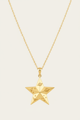 Le Stella luxury gold star pendant necklace centered on white background